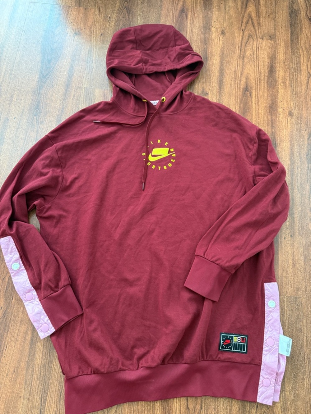 Nike Burgundy Hoodie with Yellow Logo and Pink Accents